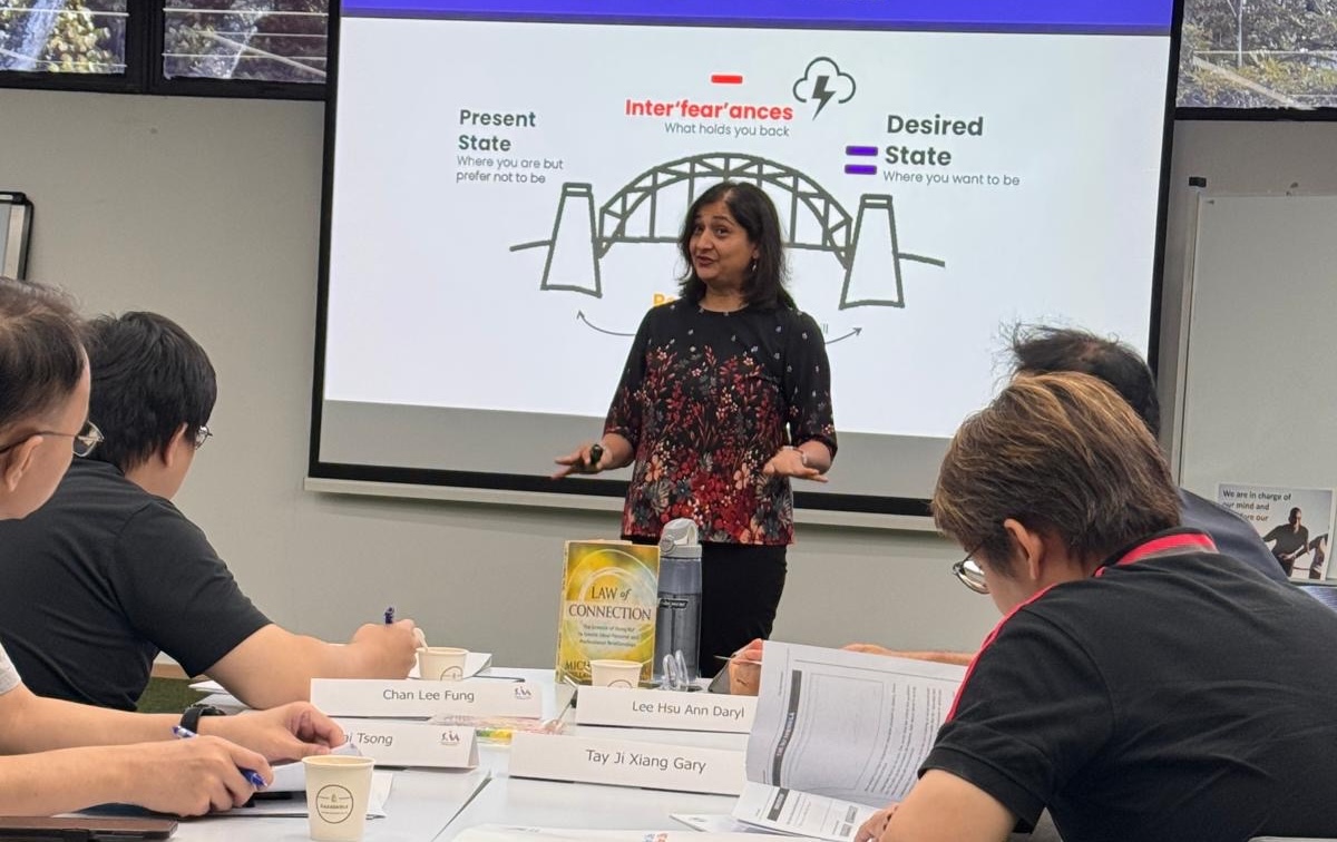 Meenakshi delivering a workshop to a manager cohort